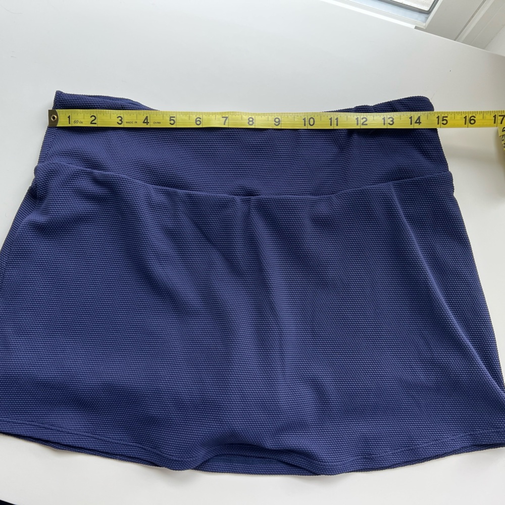 Tommy Bahama Navy Swim Skirt with  built in shorts.